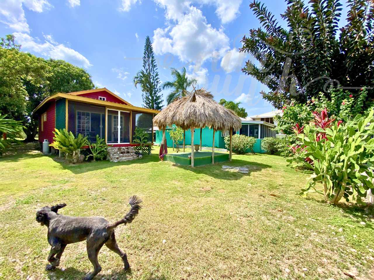 Casa Milagro - Water-view retreat with two homes on 1/2 acre in Copper Bank, Belize